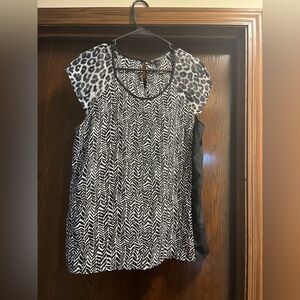 Express brand short sleeve blouse. Leopard black multi pattern. Size medium.